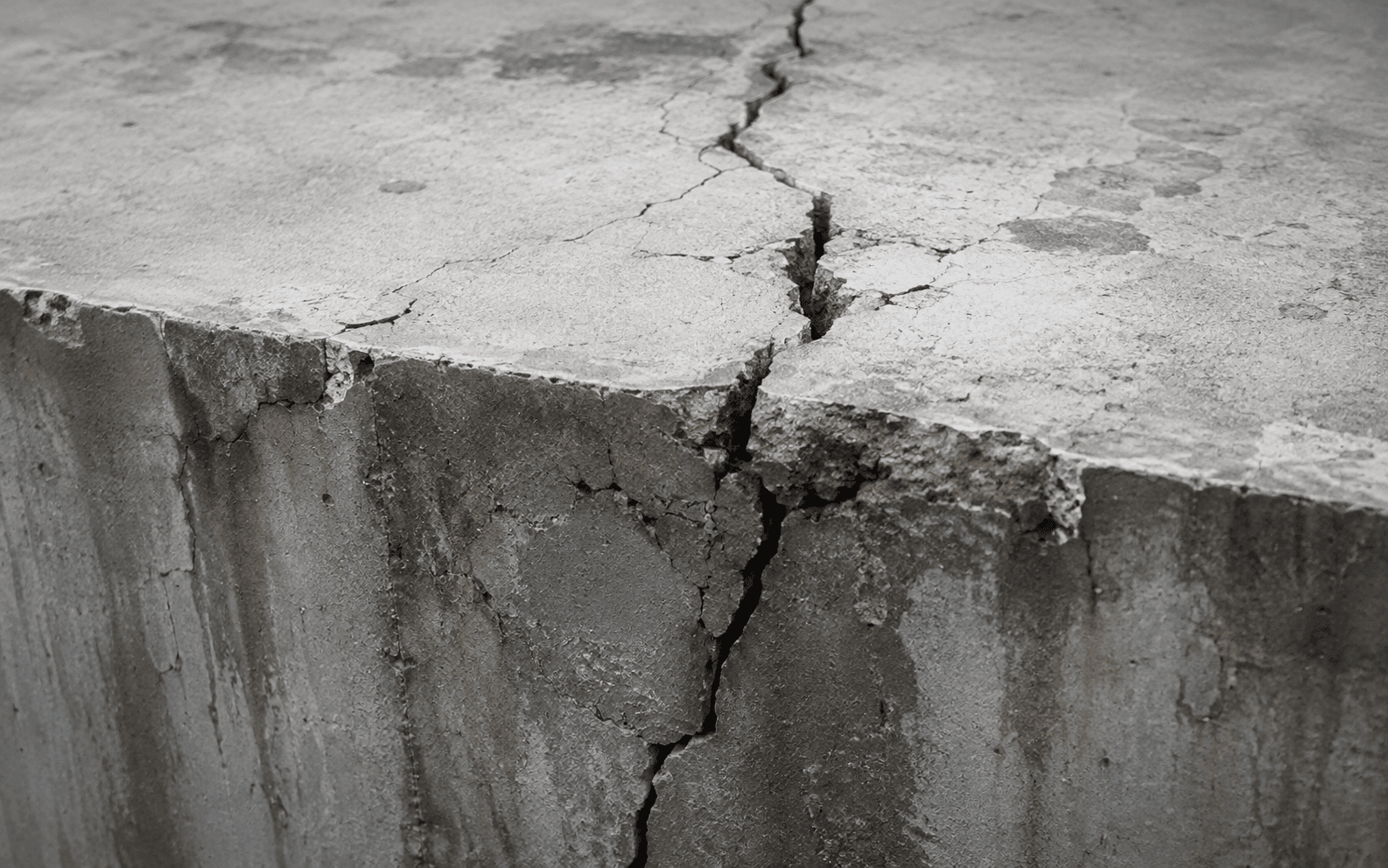 Cracked concrete surface close-up